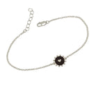heart talisman bracelet with black enamel around the embossed heart