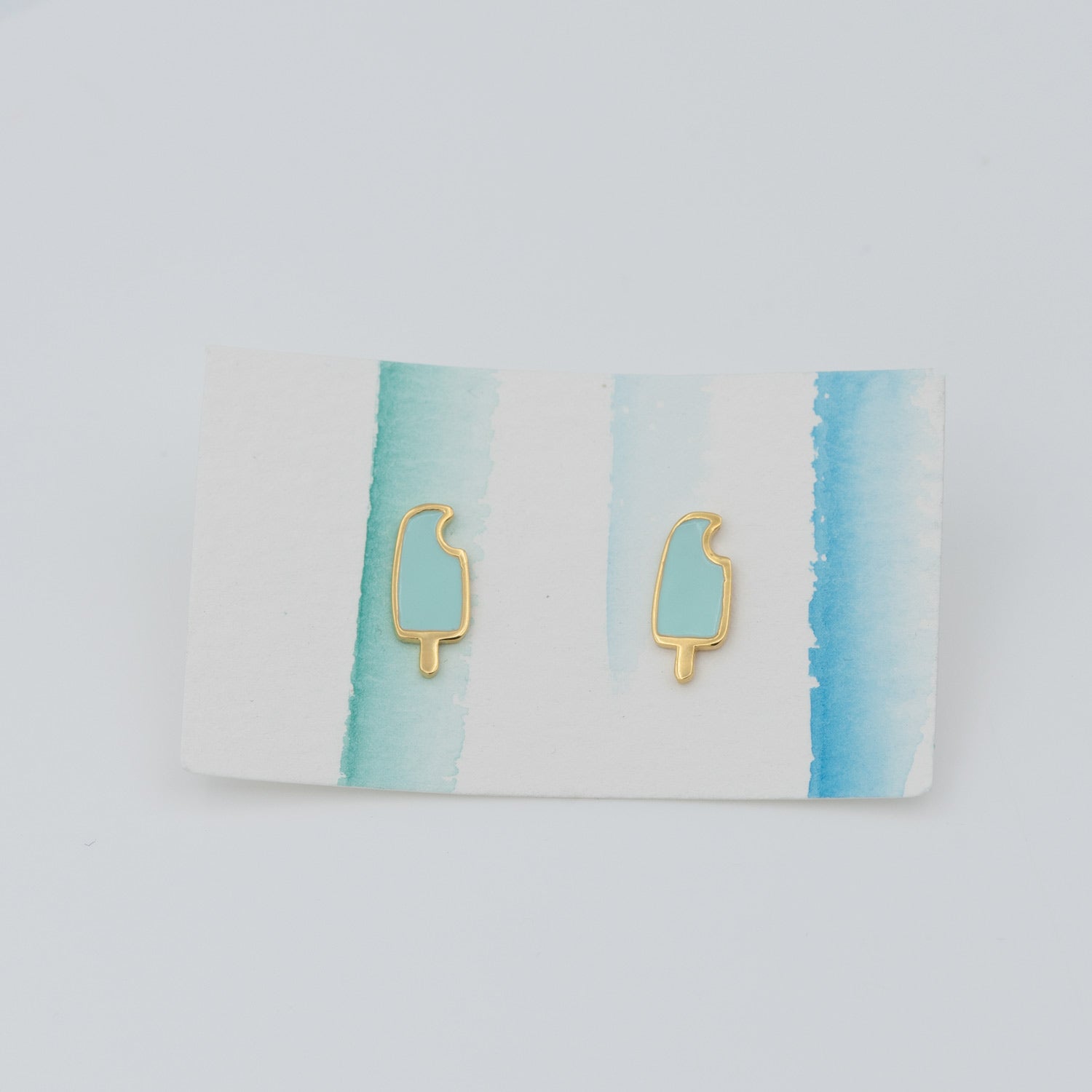 mint green popsicle studs on earrings card all-groups