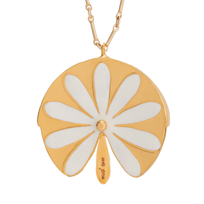 animation of the counting daisies kinetic necklace in 14k gold filled and white enamel