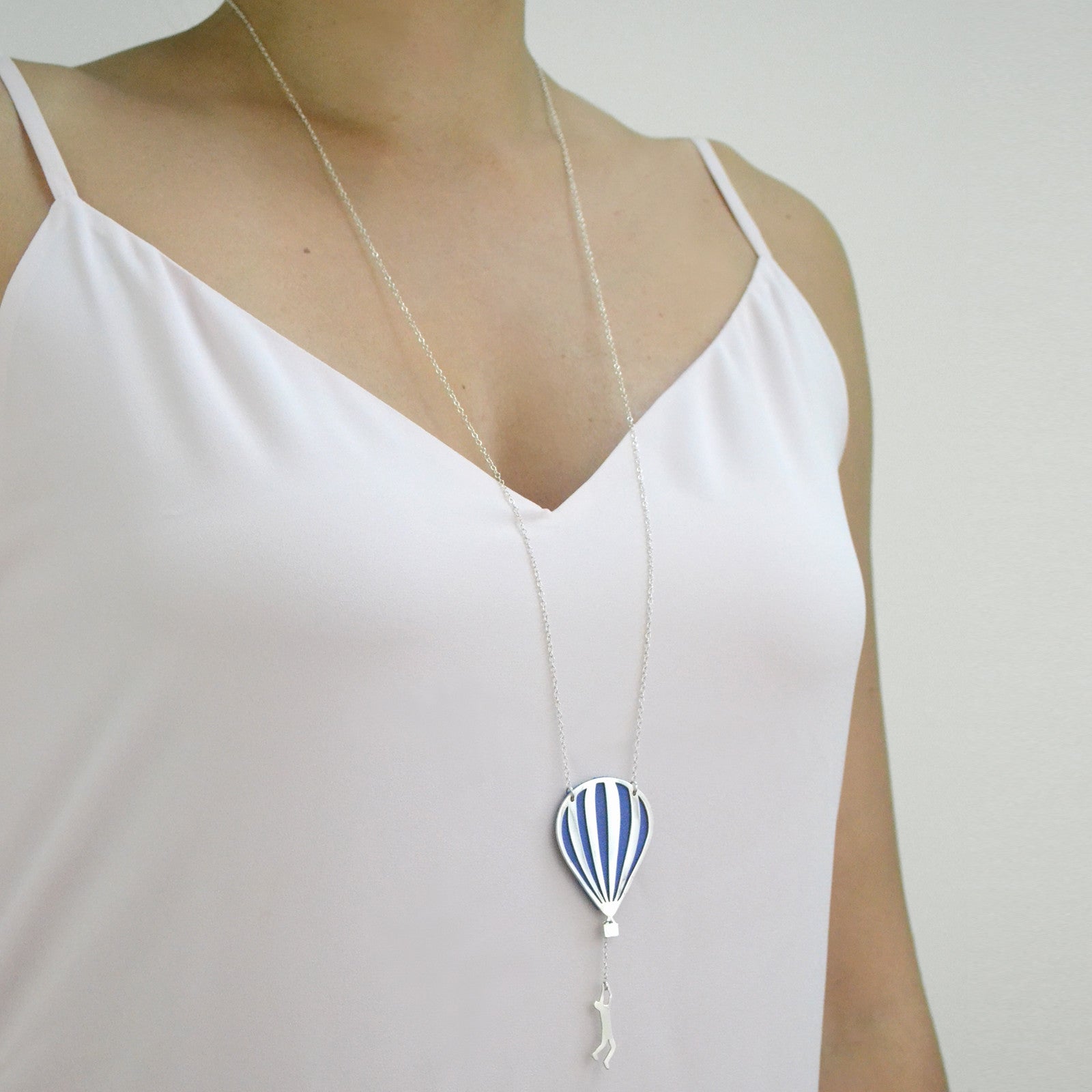 silver and blue hot air balloon worn