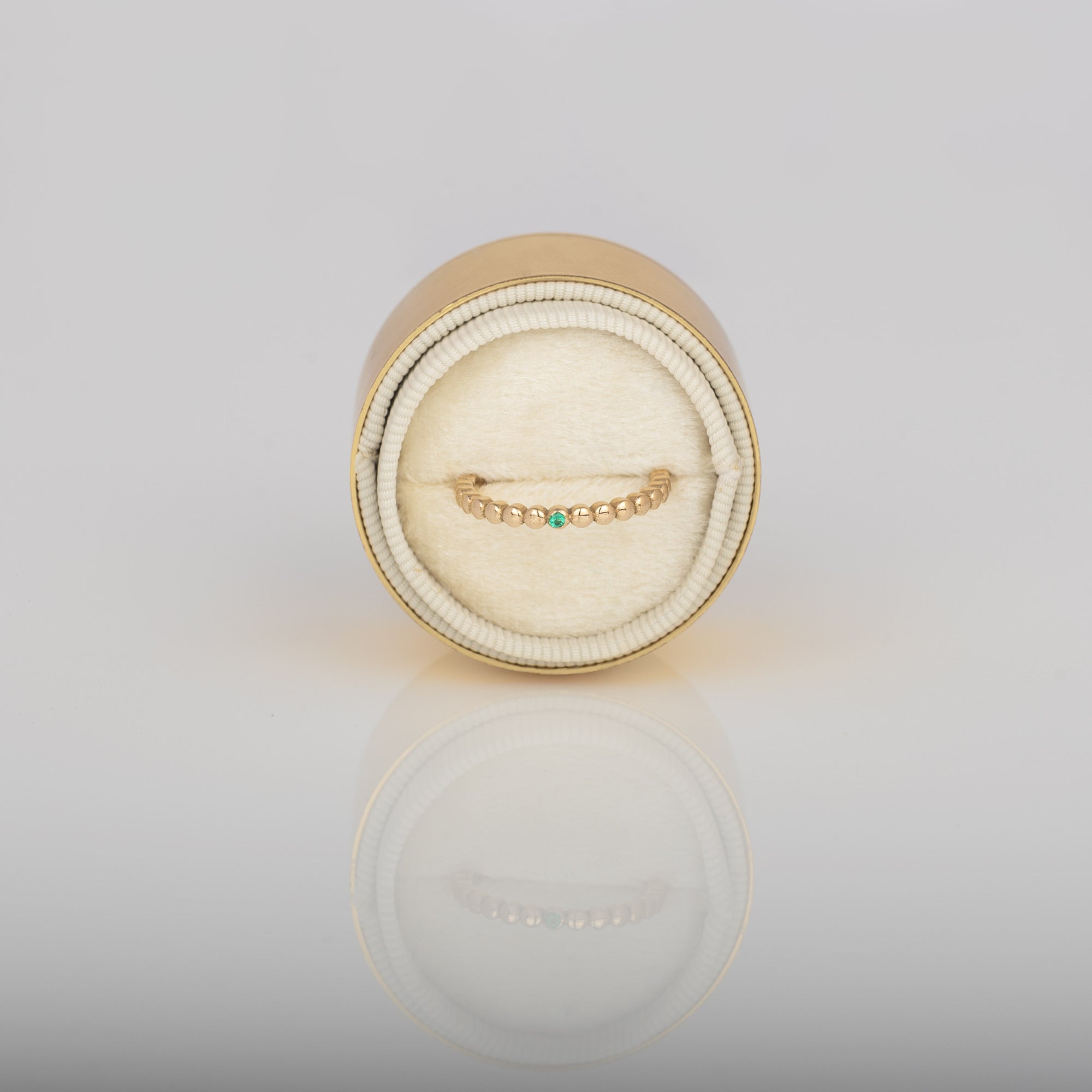 beaded 14k gold ring with emerald in velvet box